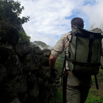 Timothy Alberino exploring undiscovered ruins near Machu Picchu, Peru.
