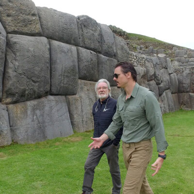 Timothy Alberino conversing with Anselm Pi Rambla about the enigmatic walls of Sacsayhuaman near Cusco, Peru.