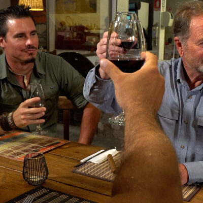 Timothy Alberino toasting the success of our expedition to a lost city in the Andes mountains of Peru with Gary Heavin.