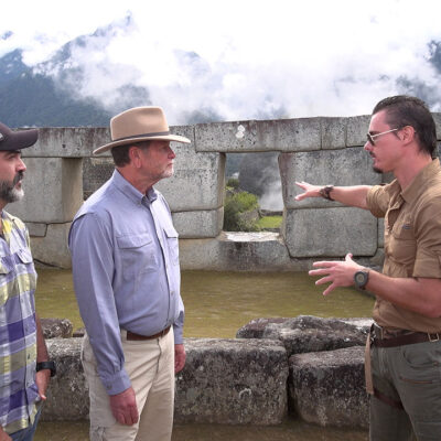 Timothy Alberino and Gary Heavin discussing the megalithic architecture at Machu Picchu, Peru.