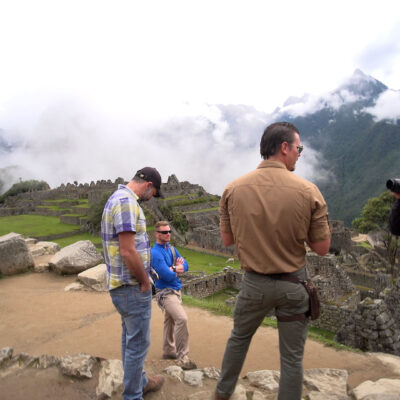Timothy Alberino filming at Machu Picchu, Peru.