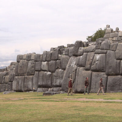 Timothy Alberino examining the megalithic walls of Sacsayhuaman, Peru.