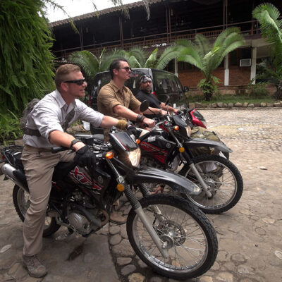 Timothy Alberino and team preparing to ride motorcycles to the market place in the Amazon jungle city of Tarapoto, Peru.