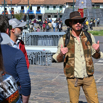 Timothy Alberino lecturing to his tour group in Cusco, Peru.