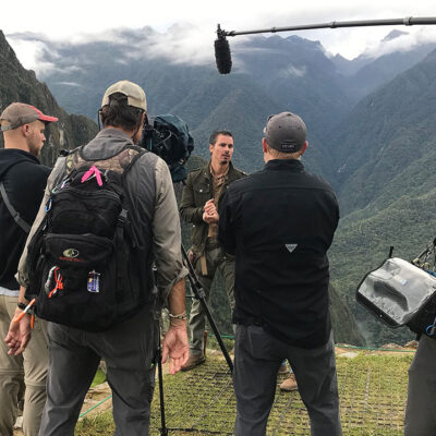 Timothy Alberino filming at Machu Picchu, Peru.