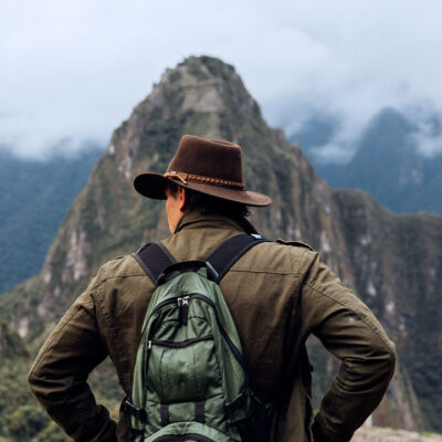 Timothy Alberino exploring the megalithic ruins of Machu Picchu, Peru.