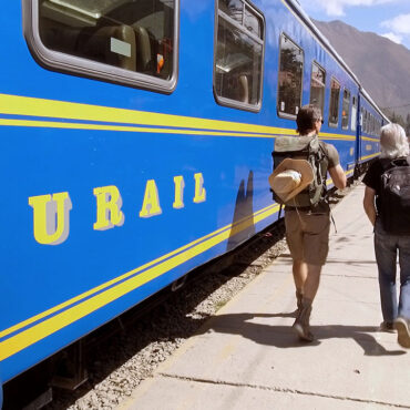 Timothy Alberino and Anselm Pi Rambla disembarking the train at the megalithic site of Ollantaytambo, Peru.
