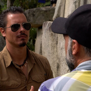 Timothy Alberino filming the megalithic foundations of Machu Picchu, Peru.