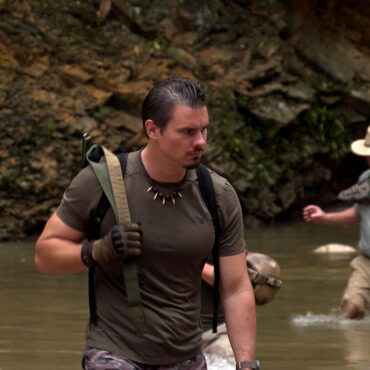 Timothy Alberino and Gary Heavin hiking to Alberino's property in the Amazon jungle.