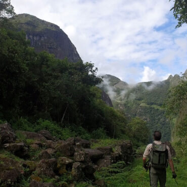 Timothy Alberino exploring undiscovered ruins near Machu Picchu, Peru.