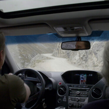 Timothy Alberino driving at 16,000 feet above sea level on some of the most dangerous roads in the world with Anselm Pi Rambla.