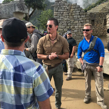 Timothy Alberino filming at Machu Picchu, Peru.
