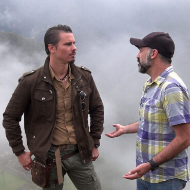 Timothy Alberino filming at Machu Picchu, Peru.