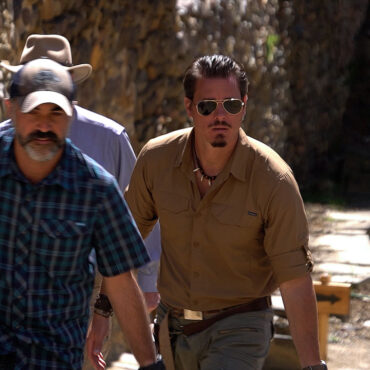 Timothy Alberino examining the megalithic blocks at Ollantaytambo, Peru.