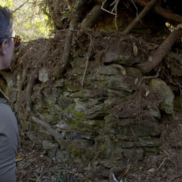 Timothy Alberino exploring the ruins of a lost city in the Andes mountains of Peru.