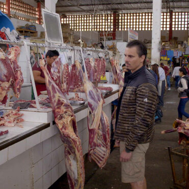 Timothy Alberino procuring supplies in the Huánuco market for our expedition to a lost city in the Andes mountains of Peru.