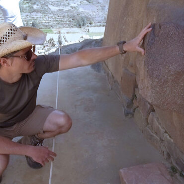 Timothy Alberino studying megalithic stones at Ollantaytambo, Peru.