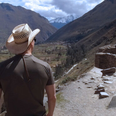 Timothy Alberino studying megalithic stones at Ollantaytambo, Peru.