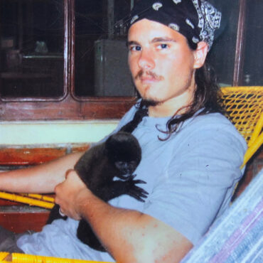 Timothy Alberino and Mr. BoJangles (woolly monkey).