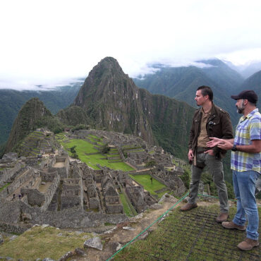 Timothy Alberino filming at Machu Picchu, Peru.